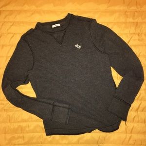 Dark grey long sleeve boys shirt.